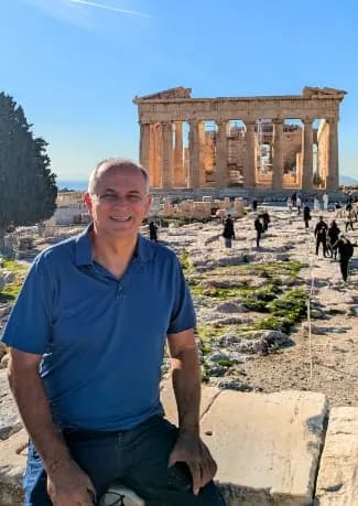 Themios Harmantzis, who built Ellinica, in front of the Parthenon in Athens