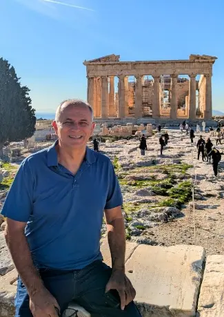 Themios Harmantzis, who built Ellinica, in front of the Parthenon in Athens